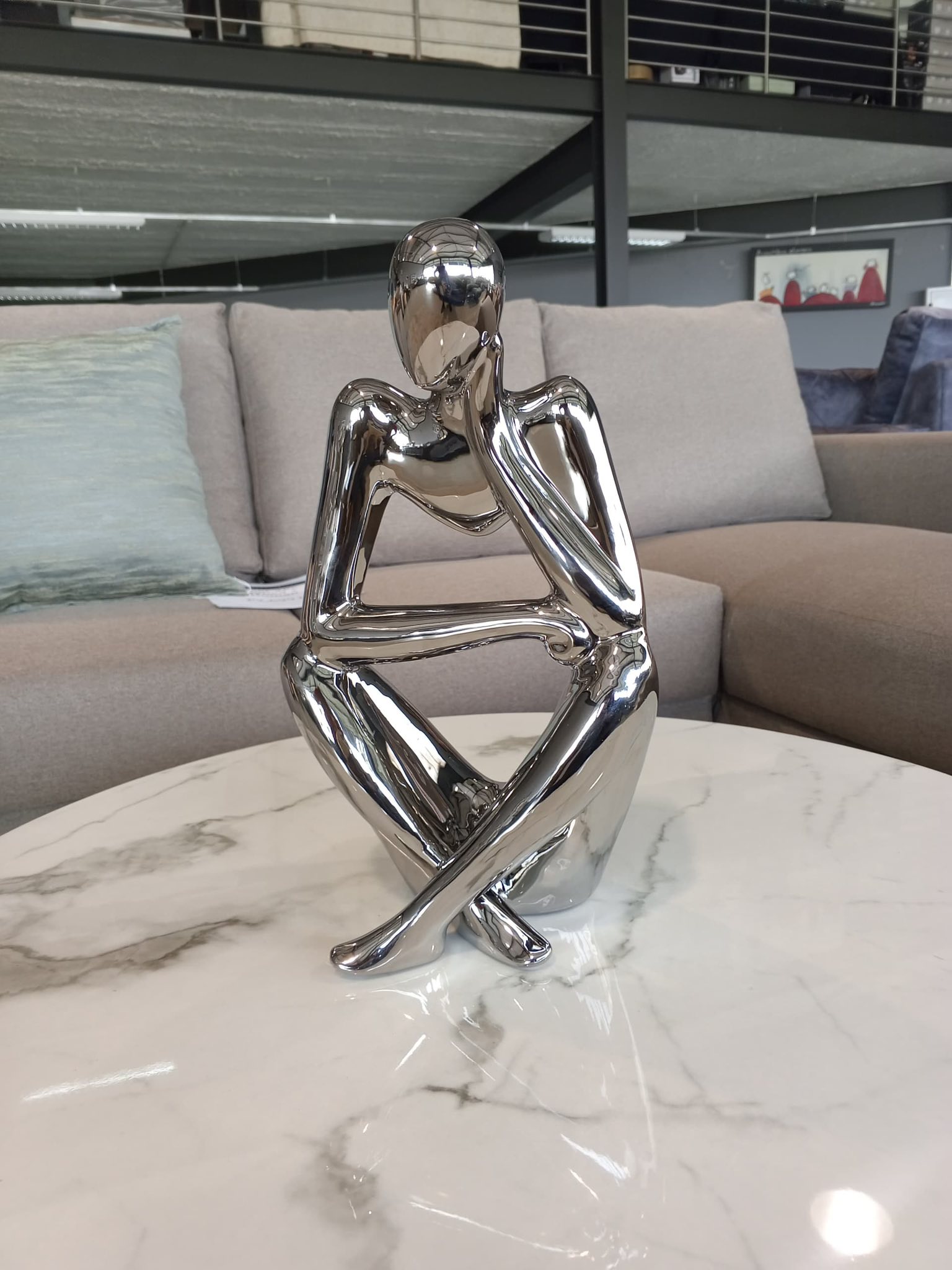 Chrome decorative sculpture at Mmabolao